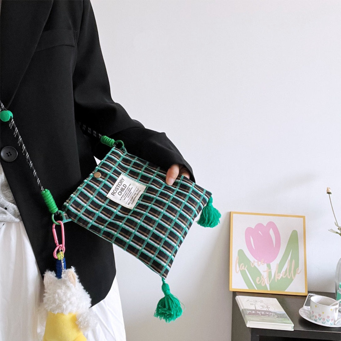 Side view of Cosbai Playful Check Phone Crossbody Bag showing and strap details