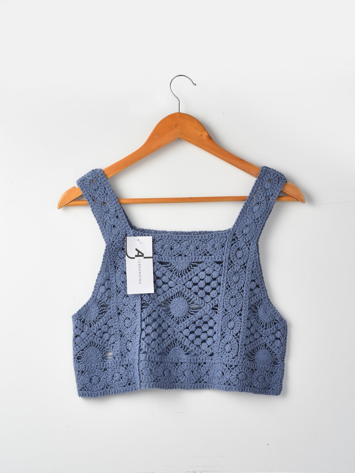 Close-up of hem and crochet texture on Crosa vintage camisole tank top