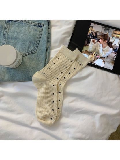 Rufia Waffle Dot Crew Socks worn on feet, showing fit and texture