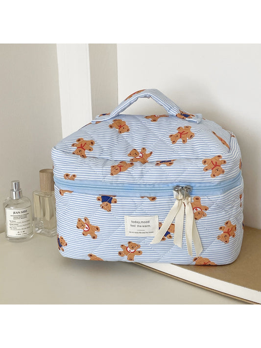 Close-up of quilted teddy pattern fabric on Cosbai beauty storage bag