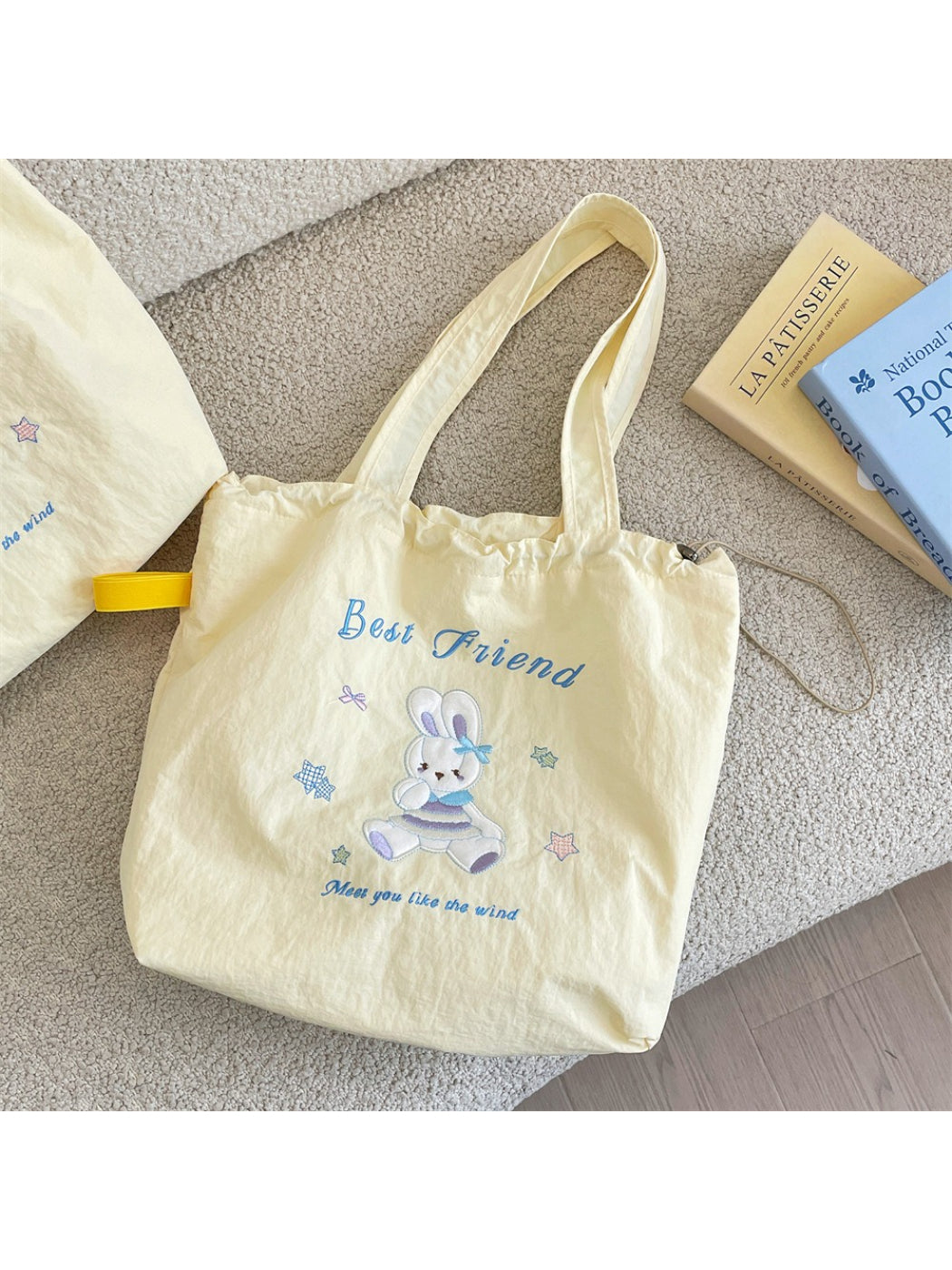 Side view of Cosbai Cute Bunny Bear Shopper Tote Bag showing handles and fabric texture