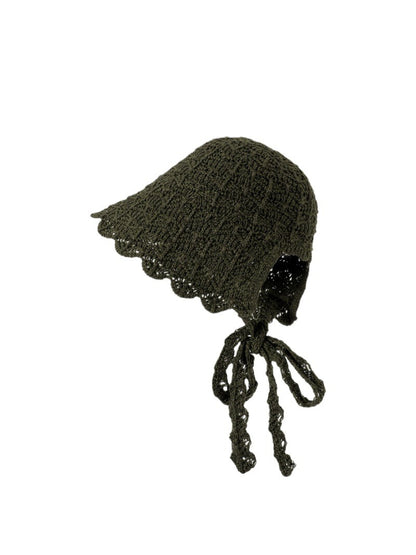 Close-up of intricate lace fabric on Haila tie back bonnet hat