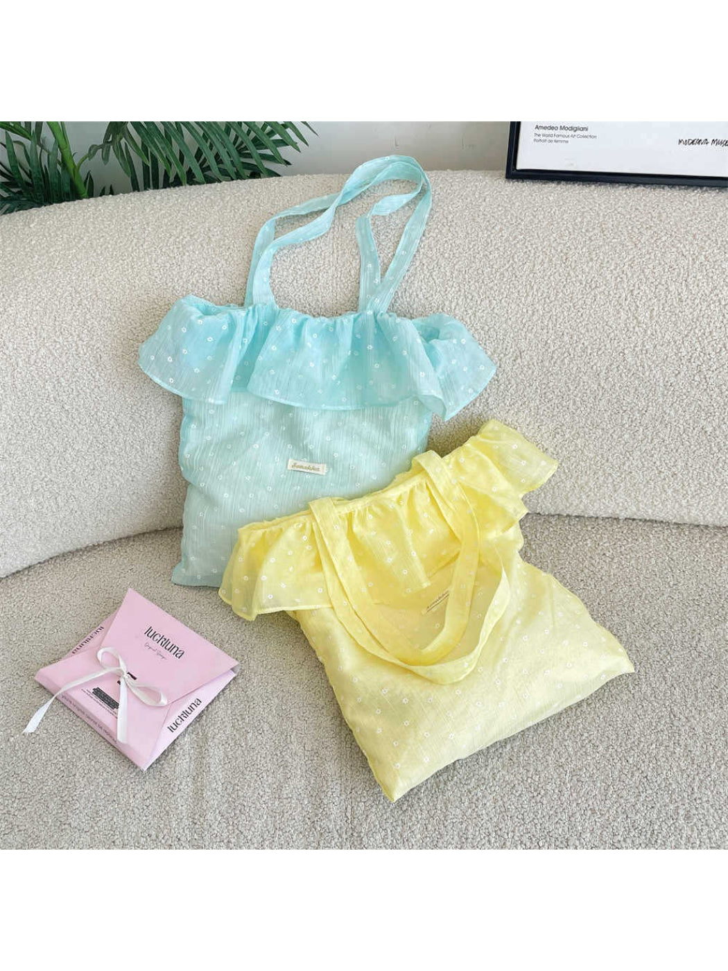 Side view of Cosbai Light Dot Ruffle Tote Bag showing ruffle and tote handles