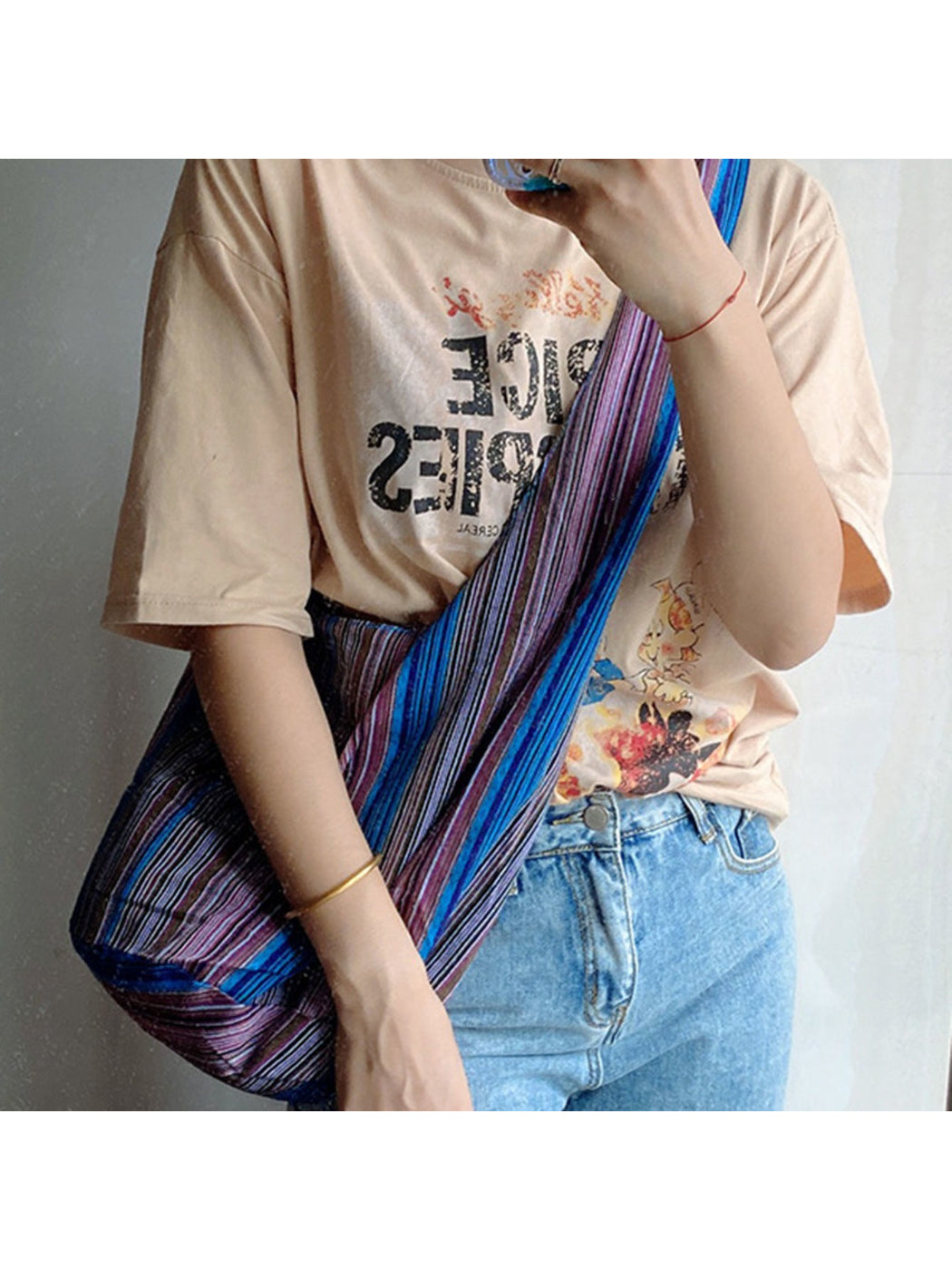 Cosbai striped slouchy crossbody bag front view with horizontal stripes