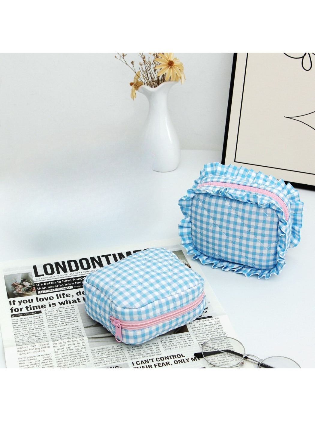 Two Cosbai checkered makeup pouches with ruffle trim displayed side by side