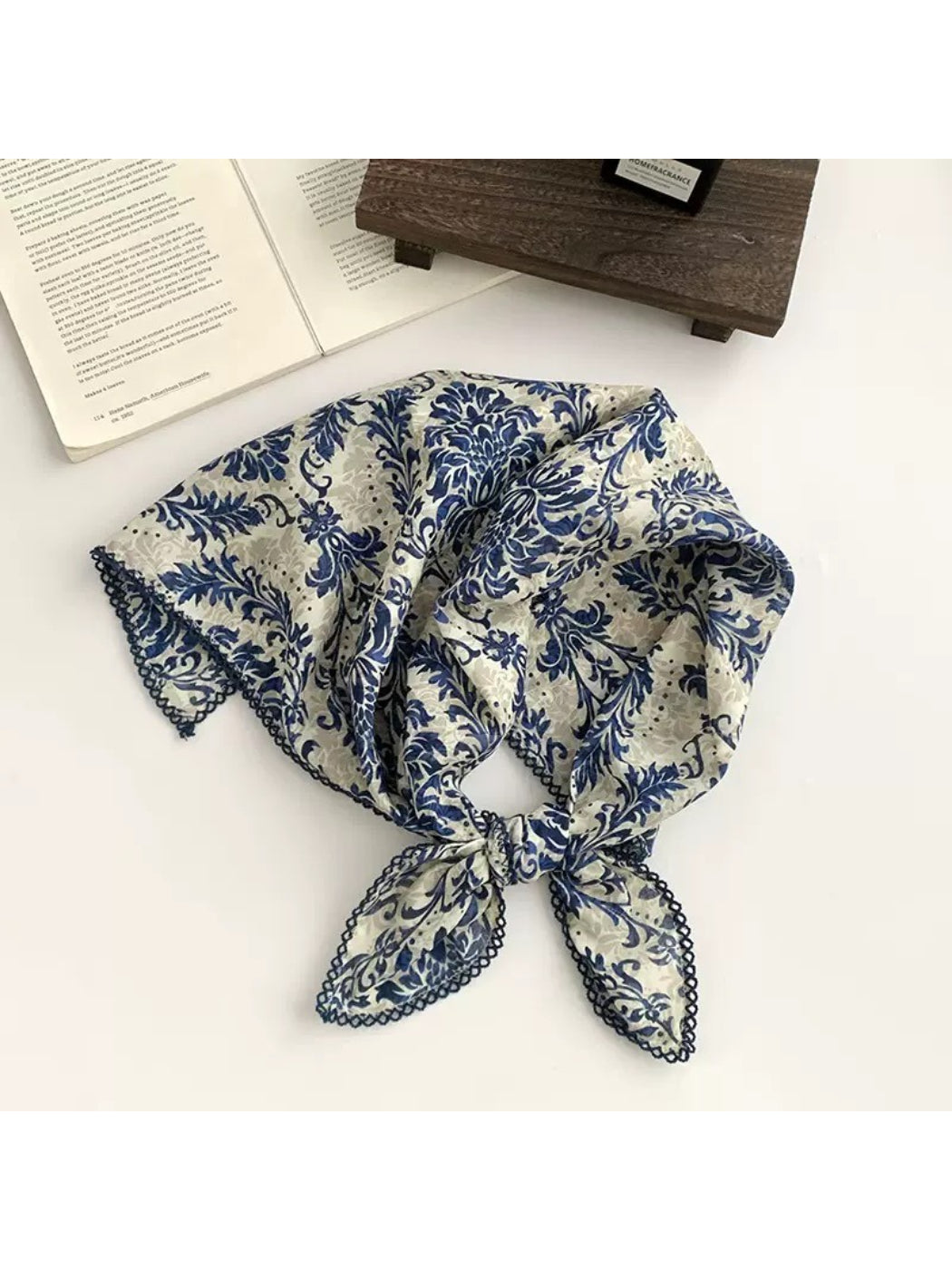 Scarvii square scarf laid flat displaying full ornate botanical design with symmetrical layout