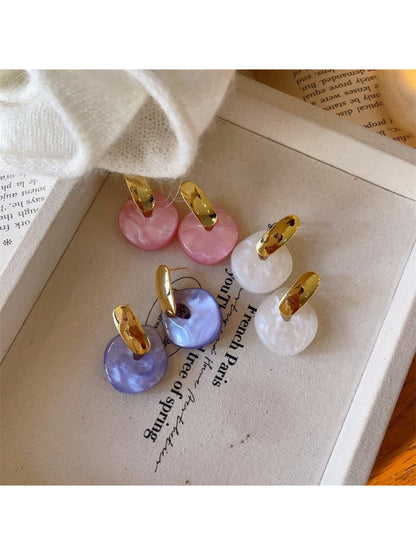 Earwish soft color round drop earrings in pastel pink on white background