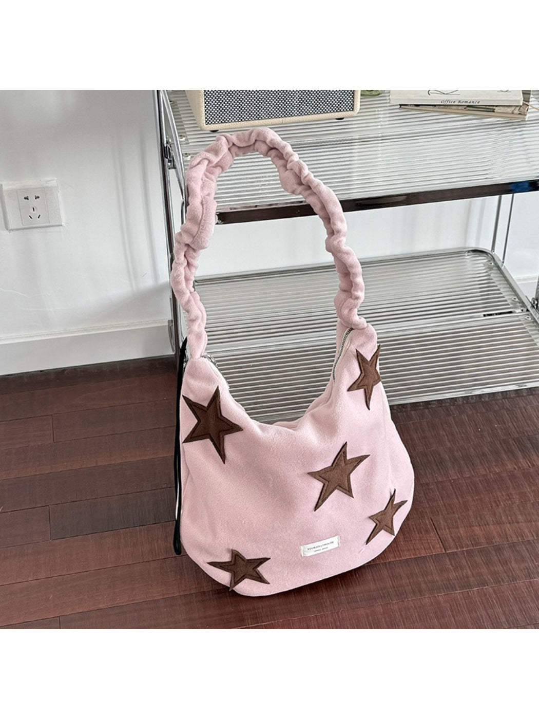 Cosbai shoulder bag displayed on white surface showing overall design