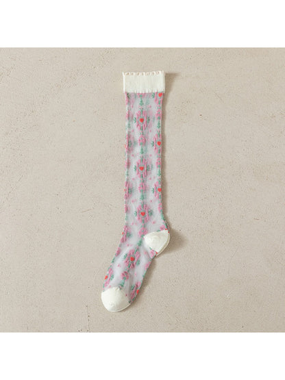 Multiple pairs of Rufia sheer crew socks arranged in a fan shape