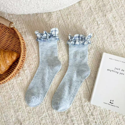Rufia ruffle pastel mid-calf socks displayed on a neutral background
