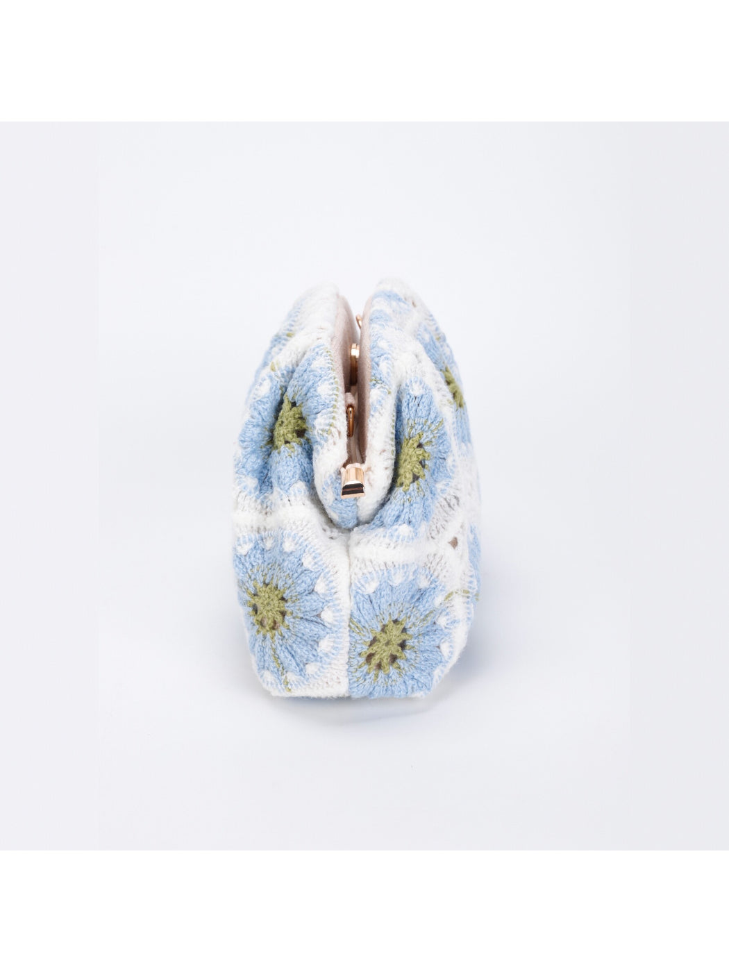Side view of Cosbai crochet floral makeup pouch highlighting