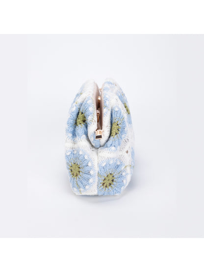Side view of Cosbai crochet floral makeup pouch highlighting