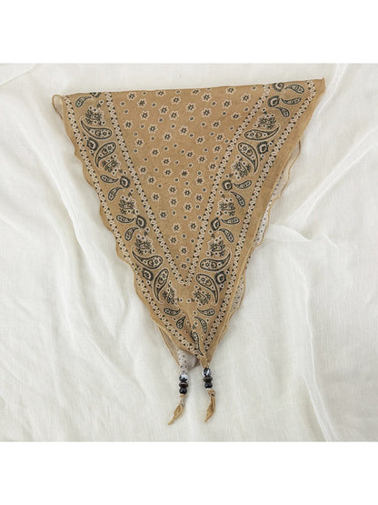 Model wearing Scarvii vintage bandana headscarf tied at the back