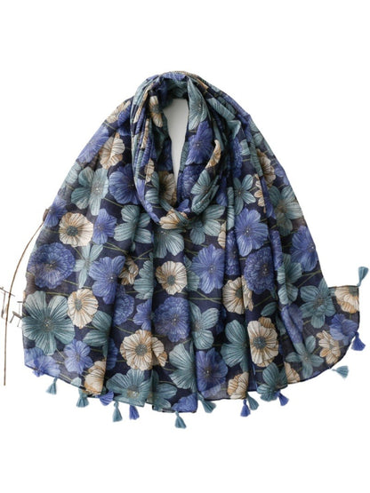 Scarvii Garden Bloom Tassel Scarf wrapped around a handbag as an accessory