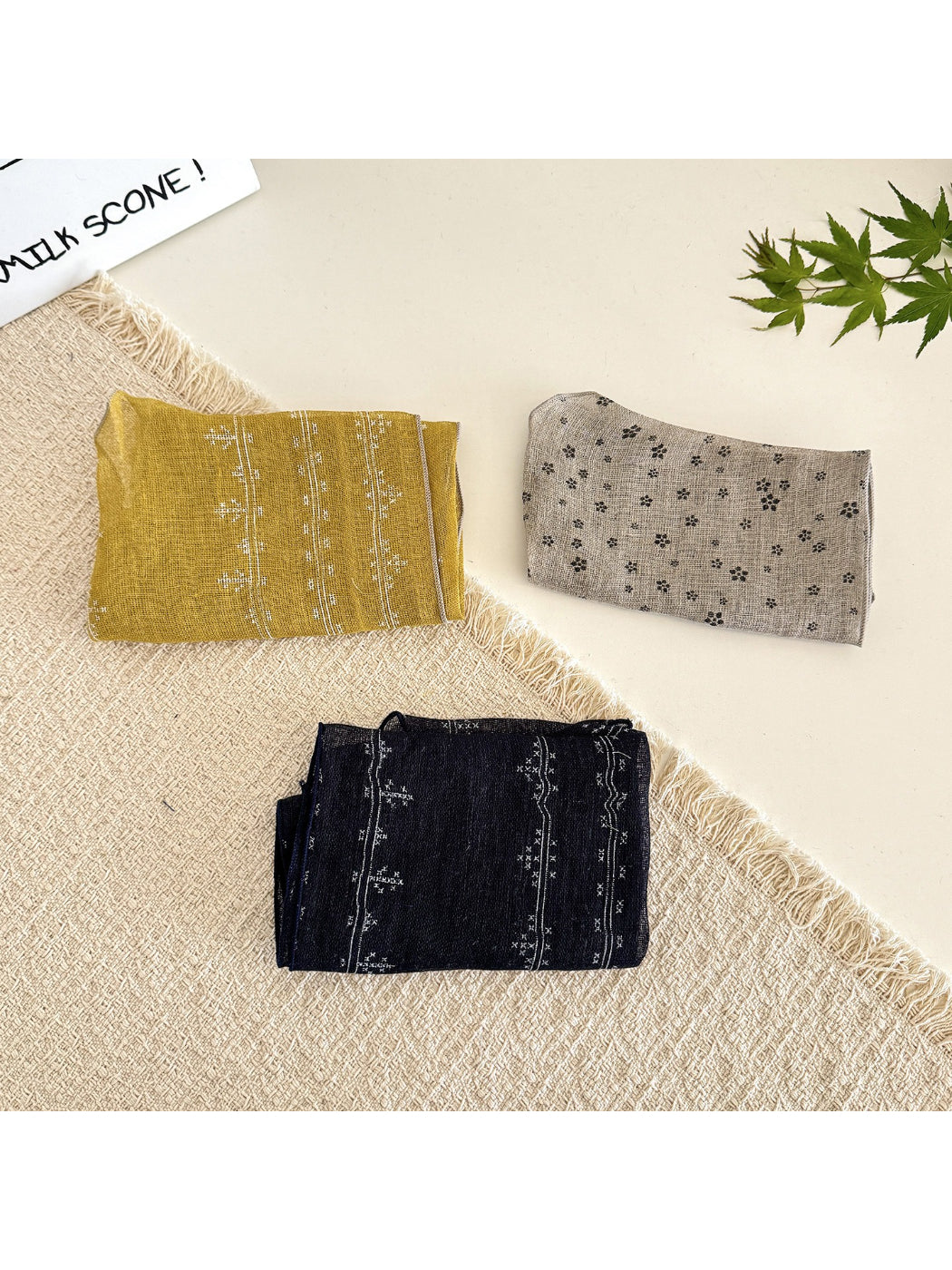 Close-up of Scarvii lightweight textured tie head scarf fabric and texture