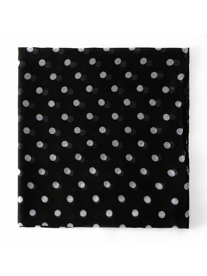 Soft fabric texture of white scarf with evenly spaced black polka dots