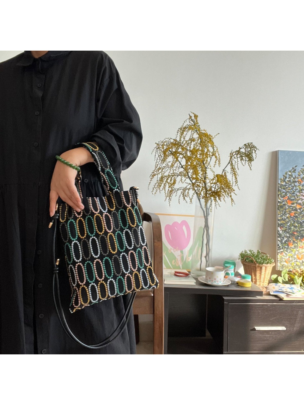 Close-up of intricate beadwork on Cosbai crossbody bag showing colorful patterns