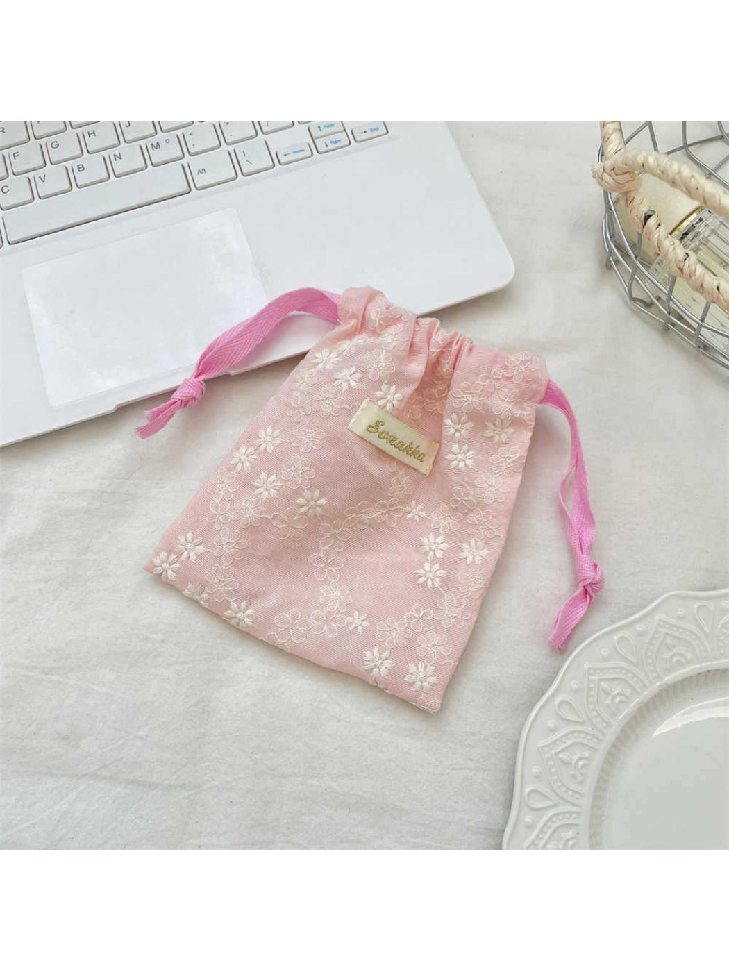 Cosbai floral lace drawstring pouch with floral lace pattern and gathered top