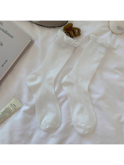 Rufia lace trim crew socks worn with casual shoes
