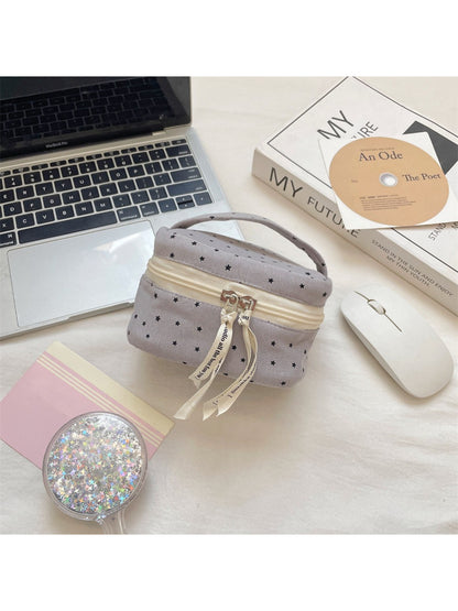 Side view of Cosbai mini cosmetic case highlighting compact size and star print design