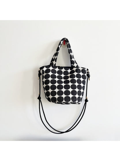 Cosbai Polka Dot Mini Tote Bag placed on white surface highlighting shape and pattern