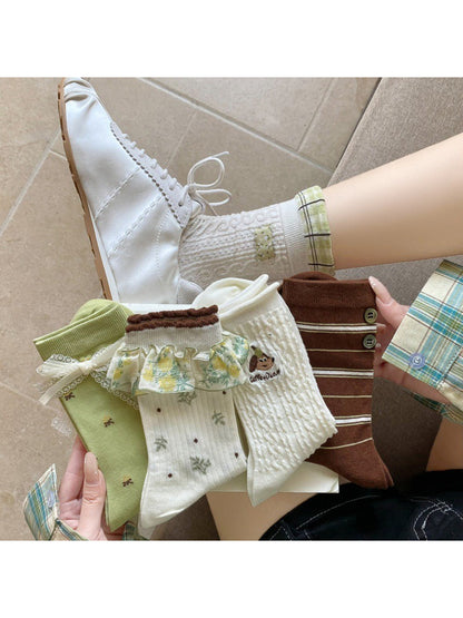 Pair of Rufia cute everyday ribbed socks in soft pastel pink color