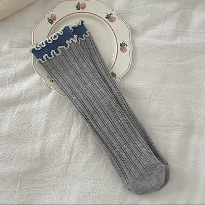 Rufia socks folded to display contrast wave trim design