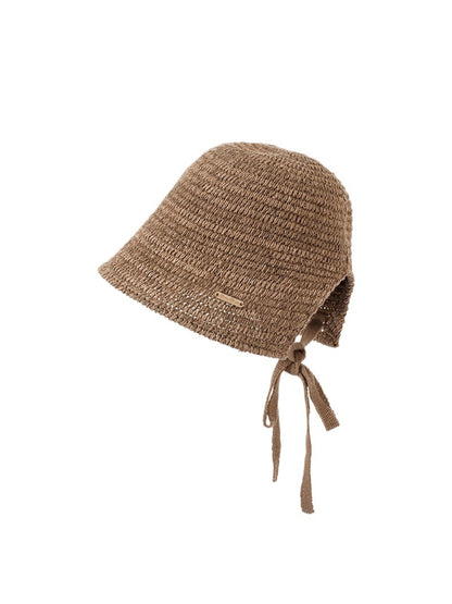 Model wearing the Haila crochet curve brim hat styled with casual outfit