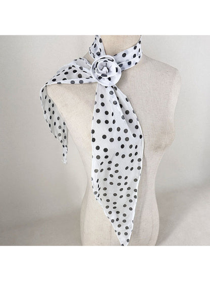 Close-up of scarf edges showing neat stitching and fabric quality