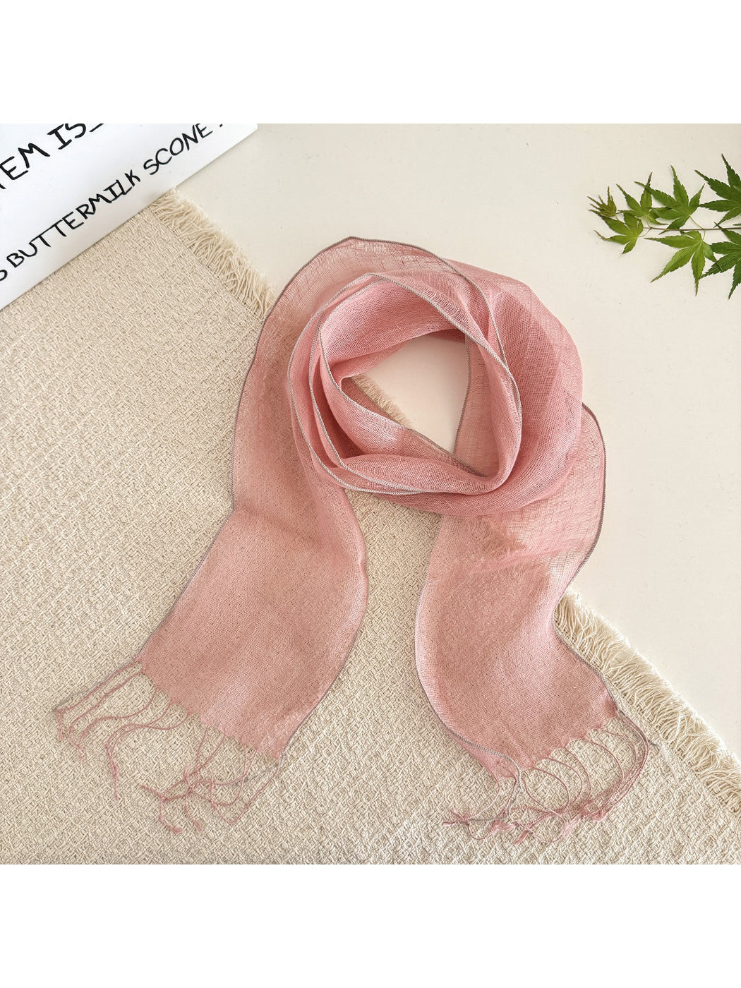 Sheer solid summer scarf laid flat highlighting its rectangular shape and soft fabric