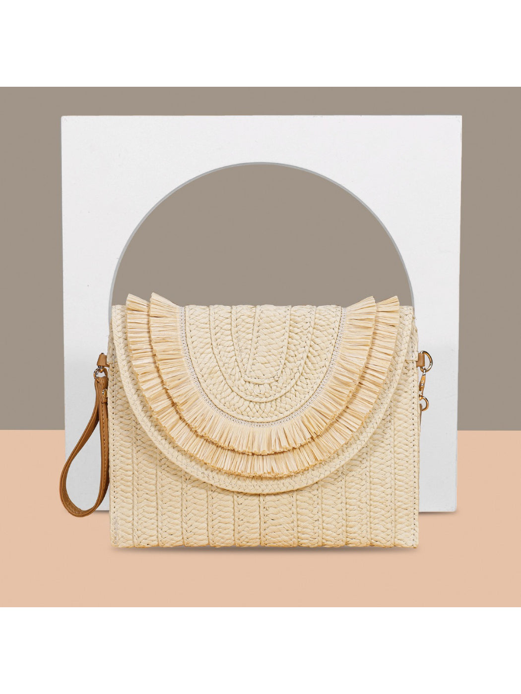 Top view of Cosbai woven tassel clutch bag with tassels spread out