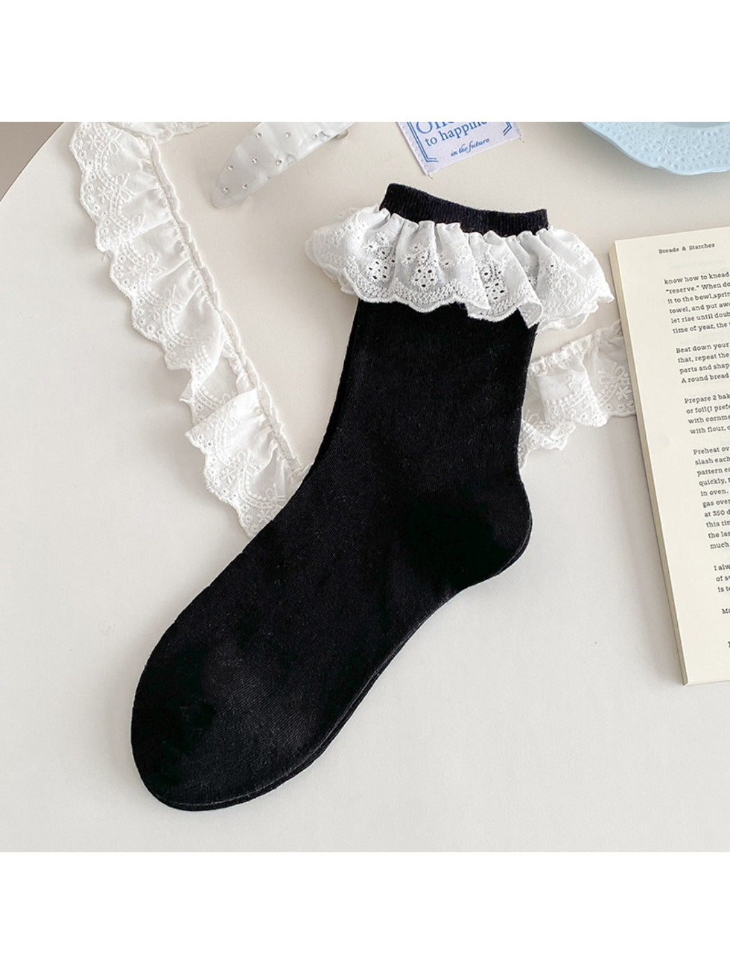 Rufia lace ruffle trim crew socks folded with lace ruffle visible