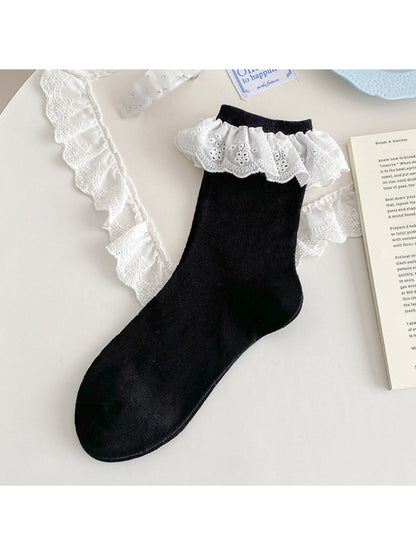 Rufia lace ruffle trim crew socks folded with lace ruffle visible