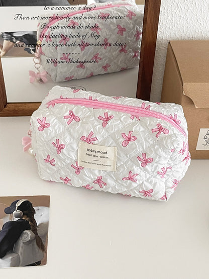 Cosbai Ribbon Print Zip Organizer open showing multiple compartments and zipper closure