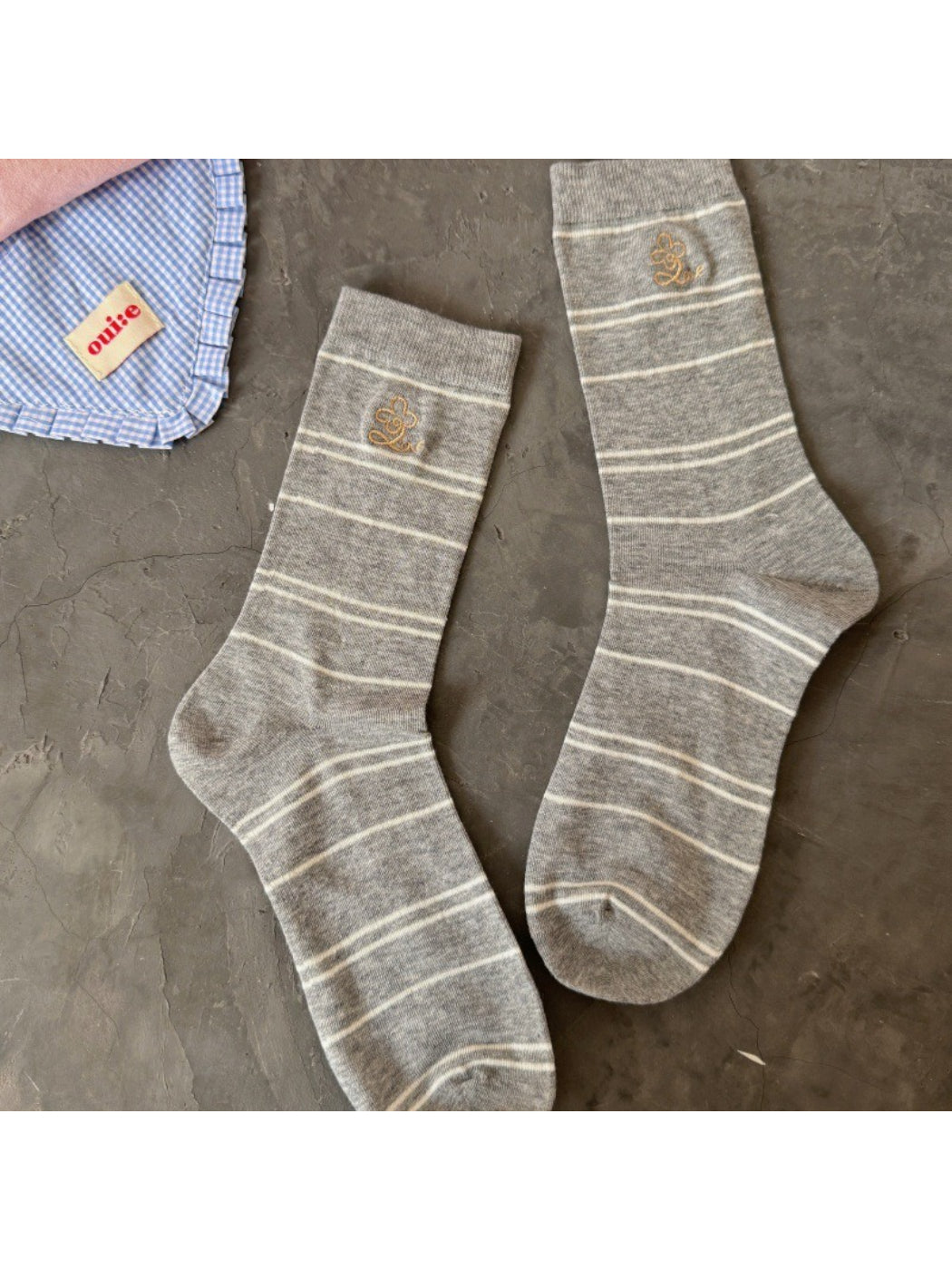 Rufia pastel stripe knit socks folded neatly showing striped pattern