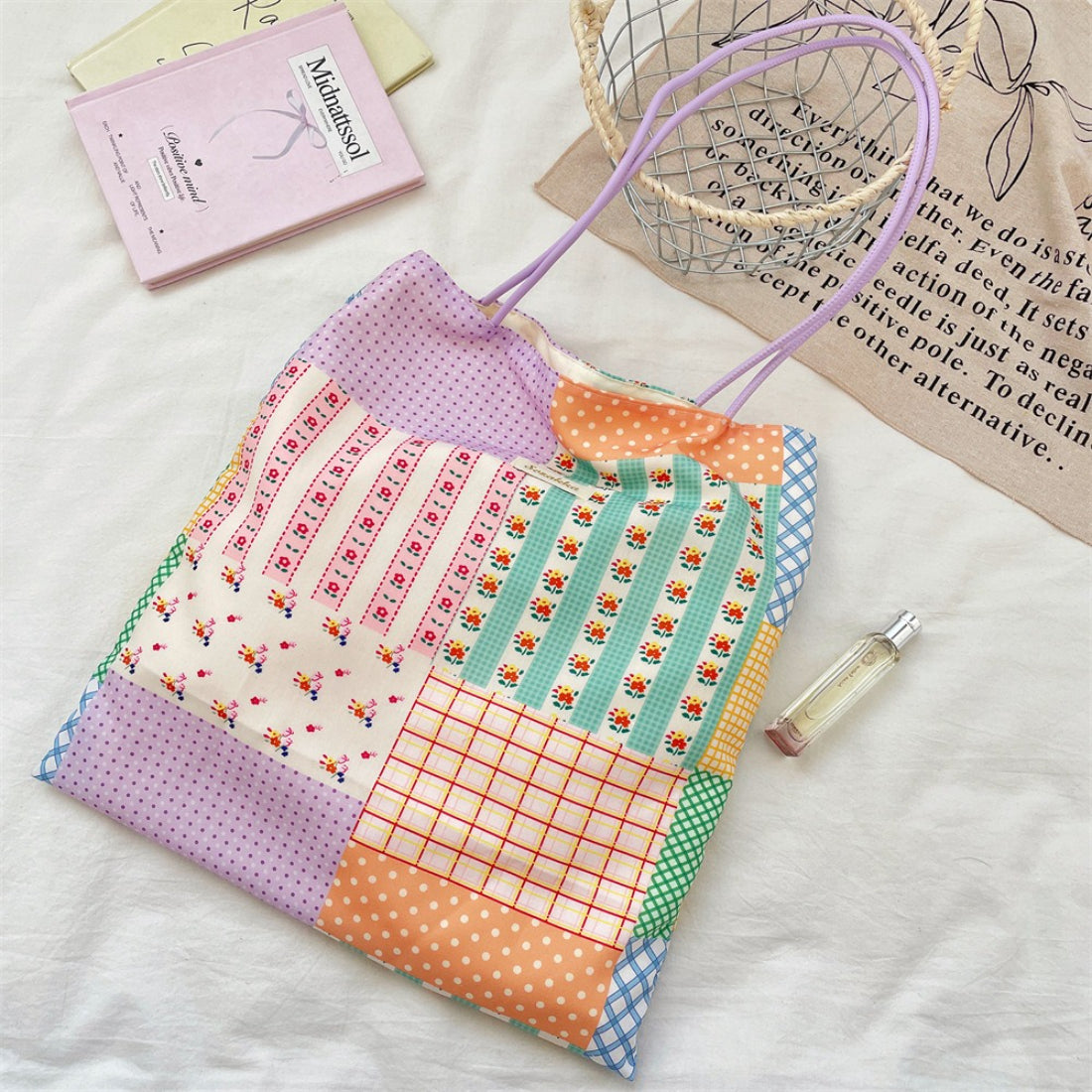 Cosbai tote bag displayed flat with visible interior and patchwork details