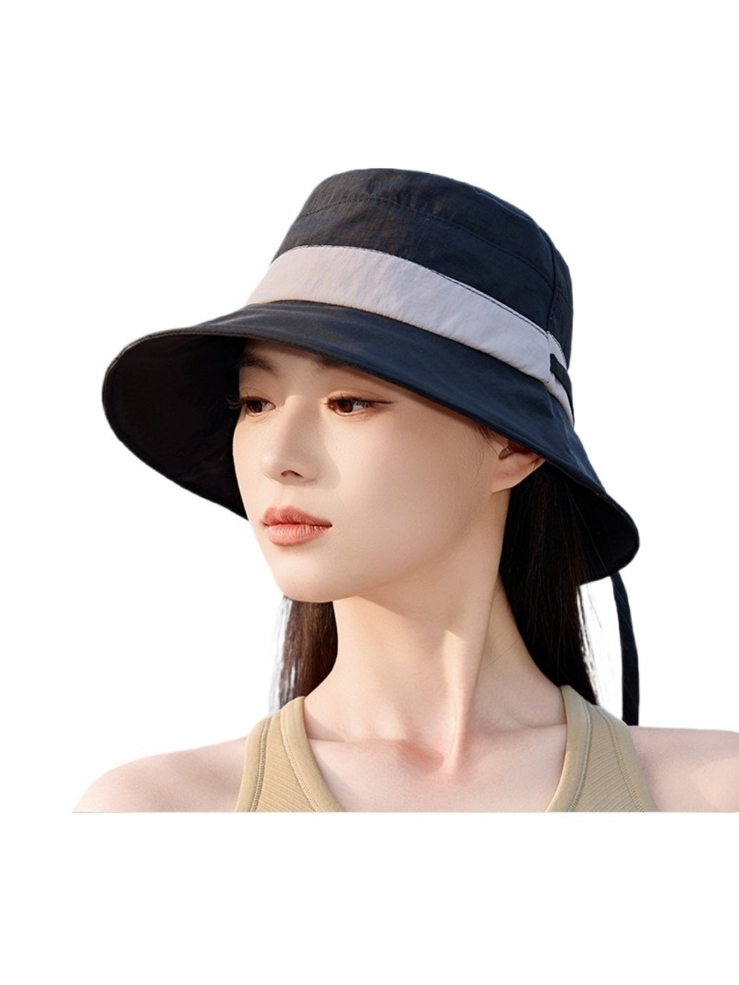 Haila bucket hat folded to show its flexible brim and fabric texture