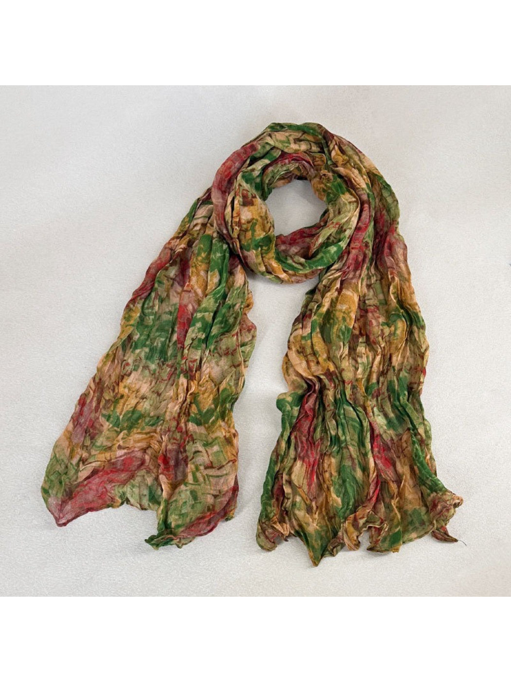 Scarvii scarf draped over a mannequin showcasing the full textured painterly print design