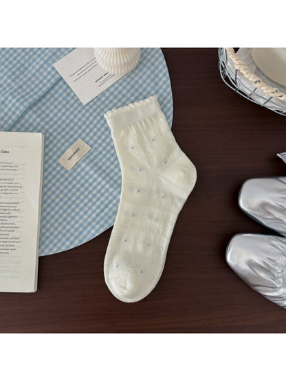Rufia sheer crew socks in soft fabric with ruffle hem, styled with casual outfit