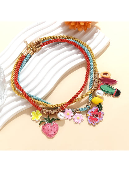 Neckit Summer Charm Necklace displayed on a white background highlighting fruit and floral charms