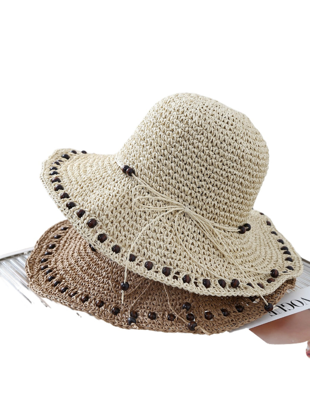 Haila beaded edge crochet bucket hat in natural beige color on white background