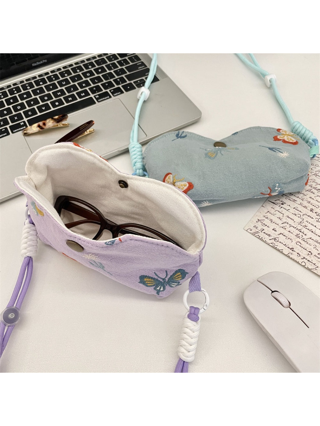 Cosbai mini floral embroidered pouch bag open, displaying interior