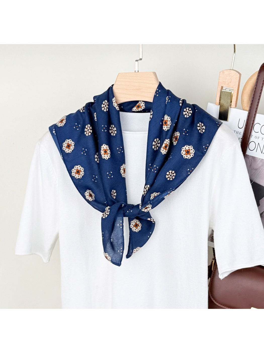 Scarvii Mini Motif Bandana Square Scarf folded showing intricate pattern in neutral tones