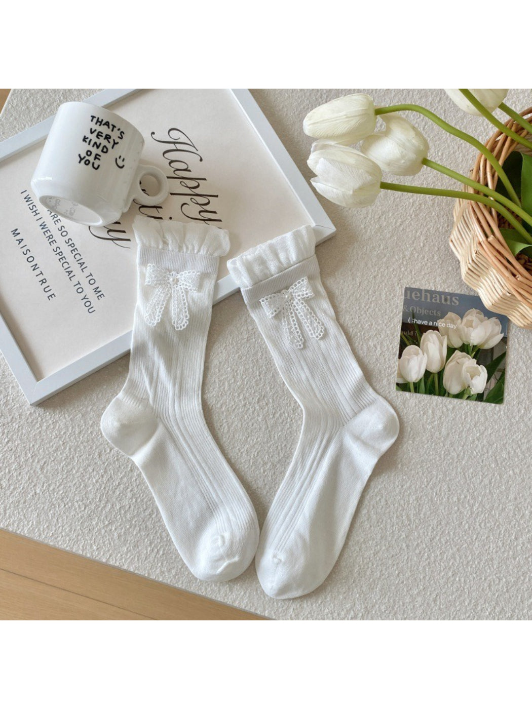 Side view of Rufia crew socks showing ribbon trim detail