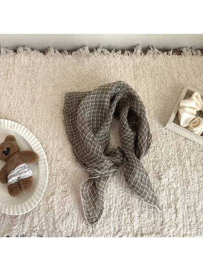 Soft check bandana scarf styled as a face covering on model