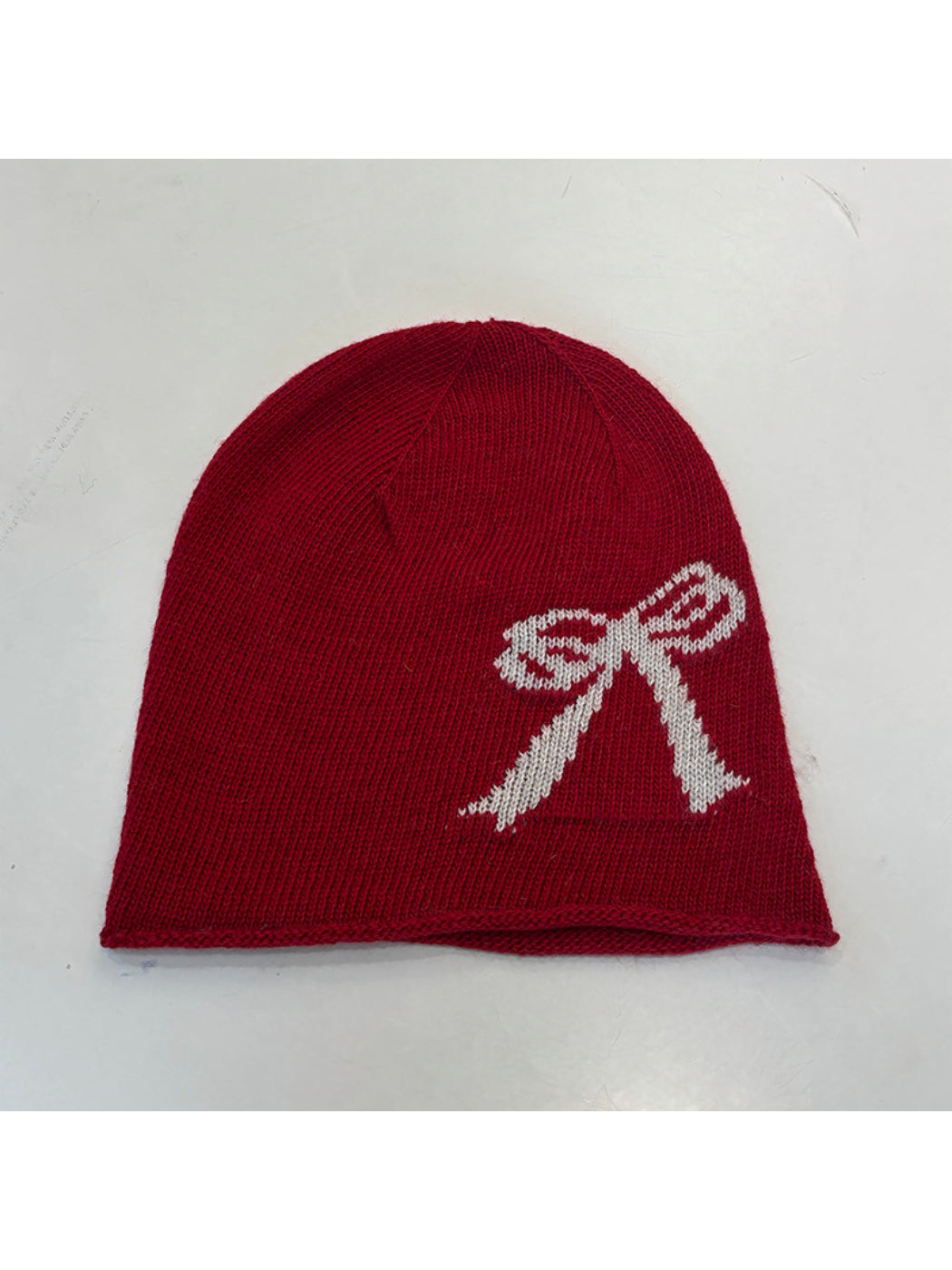 Haila - Bow and Cross Motif Rolled Edge Knit Beanie