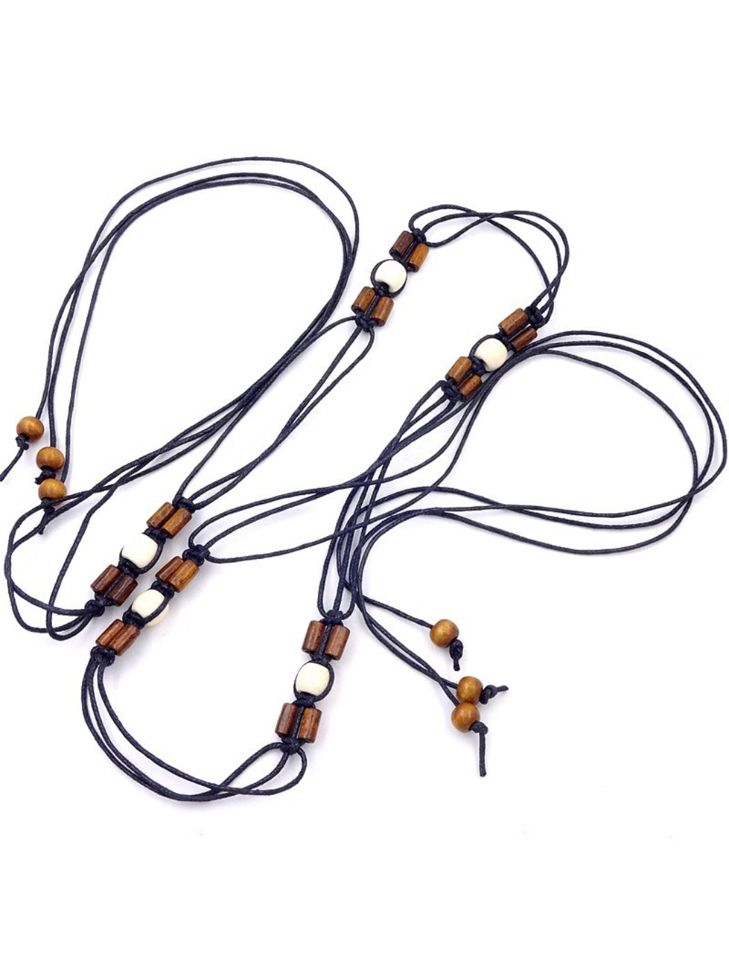 Close-up of Beco Boho rope belt with wooden beads and tie closure