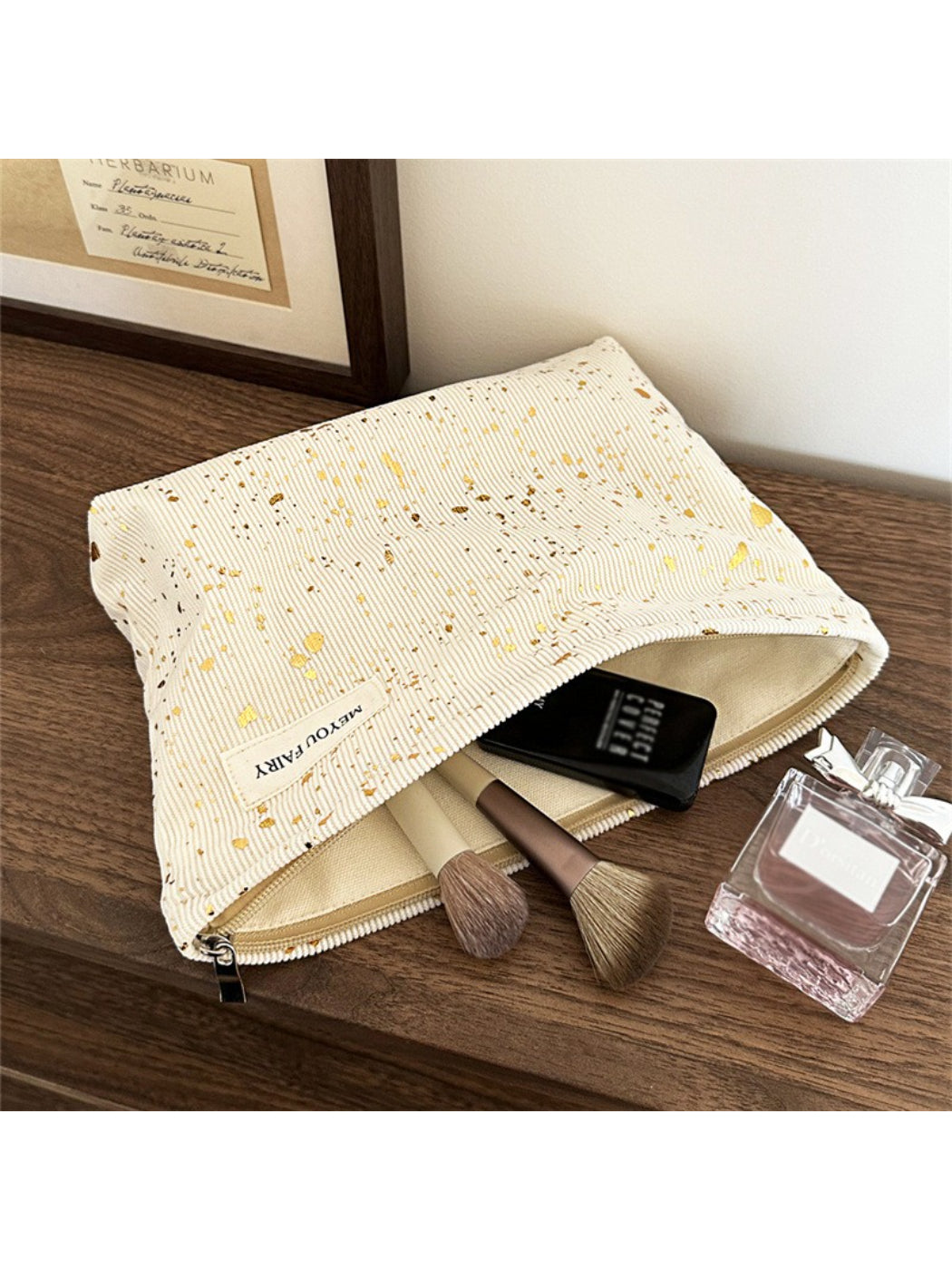 Close-up of and fabric texture on Cosbai Abstract Speckle Cosmetic Bag