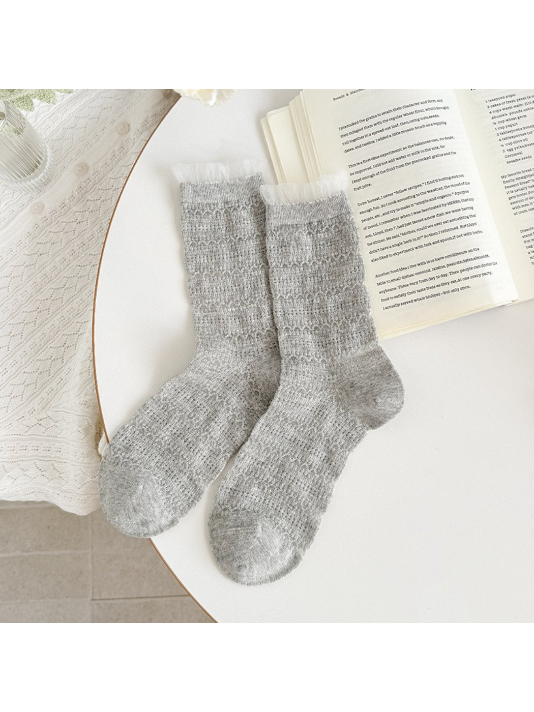 Rufia textured ruffle socks worn with loafers and cropped pants