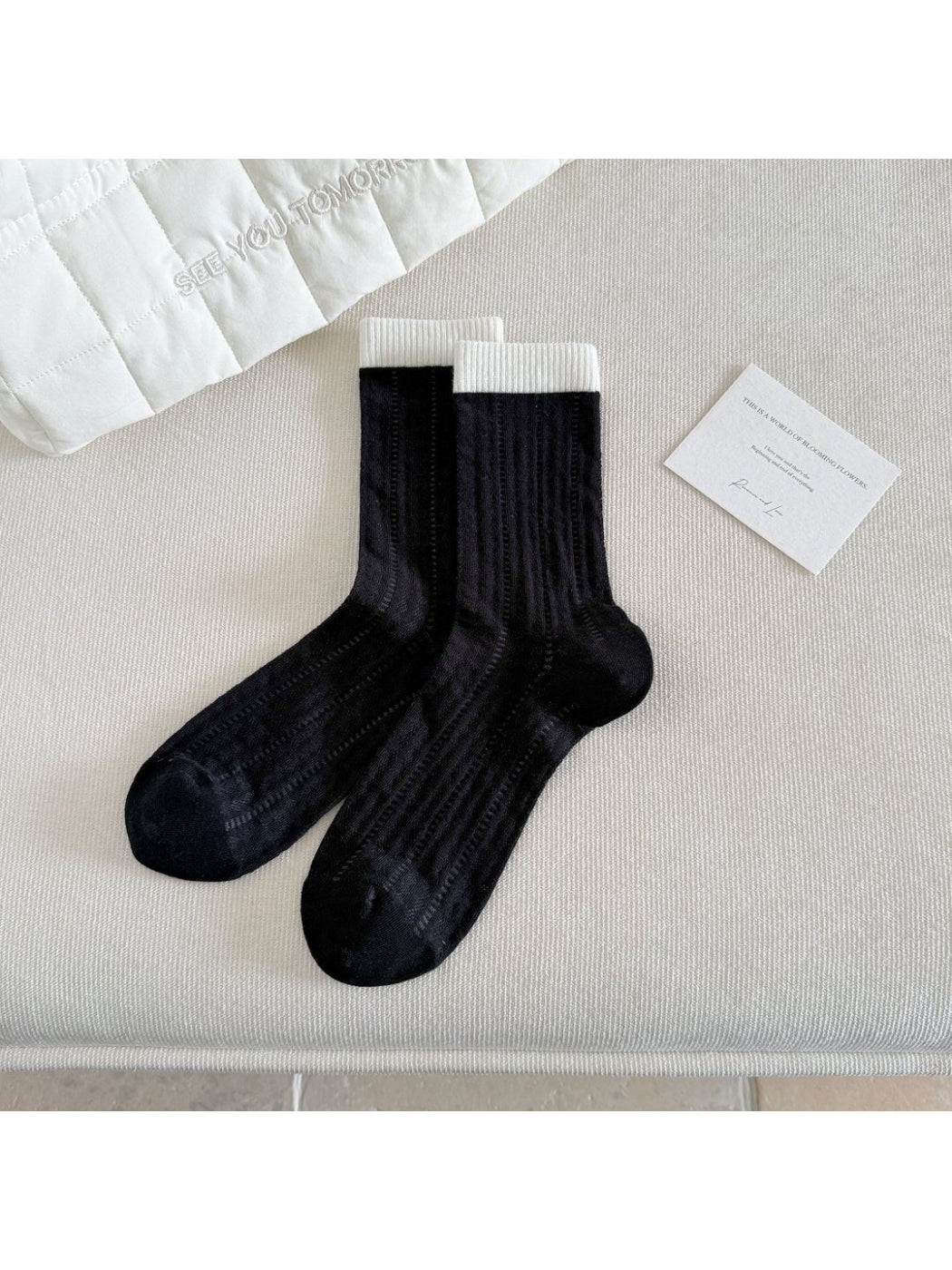 Model wearing Rufia soft ribbed colourblock socks with casual shoes
